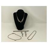 Beautiful dressy vintage rhinestone fashion jewelry, includes bracelet, necklaces, and earrings. See pictures for details.