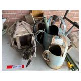 Vintage looking watering cans and assorted yard decor, see pictures for details.