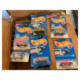 Large assortment of Hot Wheels, still in original packaging, see pictures for details.