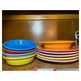 KIT… Assorted Fiestaware to include dinner plates, bowls, and small serving dish. See pictures for details.