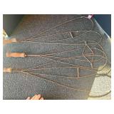 Antique wire rug whips, three pieces, electricity details.