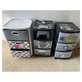 Rolling three drawer carts, two Sterilite with content, and one Home Logic. One of the Sterilite drawers is missing, see pictures for details.