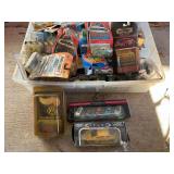 Tub of assorted Hot Wheels, Matchbox cars, and more, still new in the package, see pictures for details.