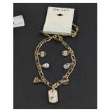 Designer Charmed Gold Tone Necklace