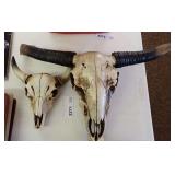Two Decorative Skulls - 1 needs repair to horn - See photos