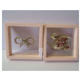 Two Decorative Brooches