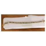 14K YELLOW GOLD OVER STERLING W/ 1/8 CARATS OF GENUINE DIAMOND TENNIS BRACELET 7" LONG 912.59 GRAMS) - CHECKOUT