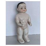 ANTIQUE "FROZEN CHARLIE" BATHING BOY PORCELAIN DOLL 7 1/2" WITH PINK CHEEKS & BLACK HAIR WITH WISPS AROUND FACE