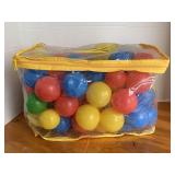 BAG FULL OF PLASTIC BALLS