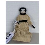ANTIQUE HAND PAINTED CHINA DOLL (MISSING ONE ARM) 4 1/4" TALL