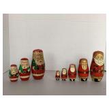 2 WOODEN SANTA NESTING DOLLS