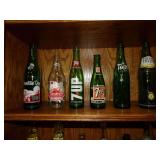 LOT OF SIX COLLECTIBLE BOTTLES, MOUNTAIN DEW, 7-UP, STEWART AND MORE