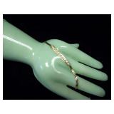 14 KARAT YELLOW GOLD BRACELET WITH SMALL DIAMONDS WEIGHING APPROXIMATELY 4.8 G