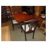 ANTIQUE DINING ROOM TABLE WITH FOUR CHAIRS, ONE MISSING SEAT CUSHION