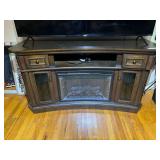 Concave media mantle with 26” infrared electric fireplace. Powers up, comes with remote, see pictures for details.