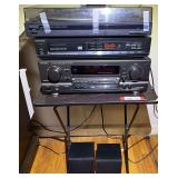 Vintage component stereo system, powers up, includes a Technics stereo receiver, Magnavox CD player, and Kenwood turntable. Also comes with two small 40 W Pioneer speakers, and TV tray, see pictures f