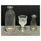 Vintage quart and pint milk bottles, also includes a vintage stemmed goblet, “Cabbage Leaf pattern, believed to be vintage Indiana glass, see pictures for details.