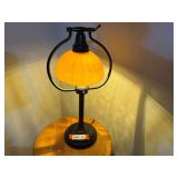 Table/desk lamp with bronze look and Amber glass shade, believed to be from Plow & Hearth, see pictures for details.