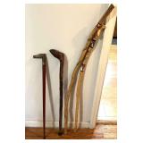 Whimsical walking sticks/canes, four pieces to include a brass horse head cane, see pictures for details.