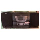 KIT… Sony all in one stereo system with CD, cassette, and radio. Also include speakers, powers up, see pictures for details.