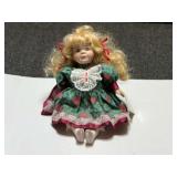 Collectible “Soft Expressions” porcelain doll, comes with a certificate of authenticity, see pictures for details.