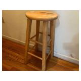 Round wooden barstool, appears to have been used as a plant stand, see pictures for details.