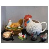 KIT… Assorted kitchen decor to include a ceramic hen pitcher, nesting hen trinket box, toothpick holder, and more. See pictures for details.