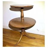 Vintage round two tier parlor/dumbwaiter table with tripod legs, see pictures for details.