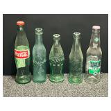 Assorted vintage soda bottles, see pictures for details.