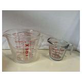 KIT...Anchor Hocking and Pyrex glass measuring cups, one cup and 4 cup respectively, see pictures for details.