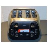 DR… Oster four slice toaster, powers up, see pictures for details.