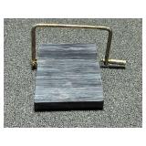 Marble based cheese slicer, see pictures for details.