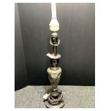 Metal table lamp with a faux marble look, see pictures or details.