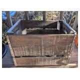 ANTIQUE WOODEN CRATE AND CONTENTS INCLUDING OLD BABY SHOES, SPRINKLER HEAD, POWER BLOCK, AND MAGNIFYING GLASS