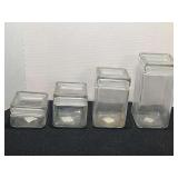 Anchor Hocking stackable glass canisters, set of four, see pictures for details.