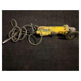 DeWalt angle grinder, missing safety guard, powers up, working condition unknown, see pictures for details.