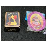 Collectible Coca-Cola tin with content, also includes collectible Coca-Cola snack trays, see pictures for details.