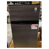 Avanti mini fridge with freezer, powers up, working condition unknown, see pictures for details.