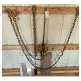1-1/2 TON CHAIN LEVER HOIST, TWO EXTRA 3/8 IN LINK CHAINS, AND SMALL PIECES OF SHEET METAL BEHIND