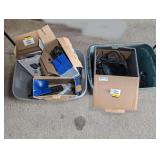 TWO STORAGE TUBS FILLED WITH FISH FINDERS AND ASSOCIATED ACCESSORIES INCLUDING LOWRANCE, EAGLE, AND GARMIN