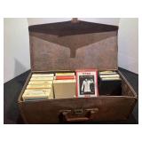 Vintage eight track tape storage case, contains some eight tracks, see pictures for details.