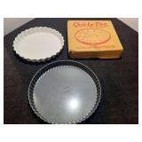 Wilton tart pan with removable bottom, includes ceramic quiche pan, see pictures for details.