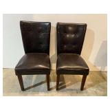 Faux leather dining chairs, set of two, see pictures for details.