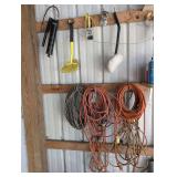 ALL ITEMS HANGING IN WALL AREA MARKED 9004 INCLUDING DROP CORDS, GREASE GUN, ROPE, AND MORE