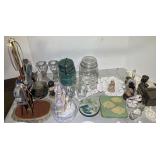 Assorted home decor to include a metal “train engine” coin bank, vintage/antique canning jar, candleholders, figurines, and more. See pictures for details.