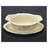 Vintage O. P. Co. Syracuse China Federal Shape gravy boat with floral motif, approximately seven pieces, see pictures for details.