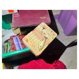 Mystery lot of assorted table coverings, assorted books, and more. See pictures for details.