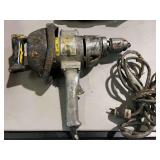 Large vintage heavy-duty drill, powers up, working condition unknown, needs a new cord, see pictures for details.