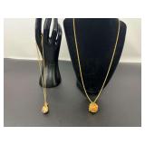 Joan Rivers gold tone necklace with Faberge-Egg inspired pendant with hinged top, also includes a Joan Rivers red and gold Fabergé-inspired enamel egg pendant necklace.