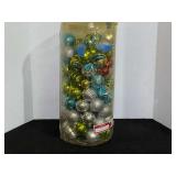 Container of shatterproof Christmas ornaments, see pictures for details.